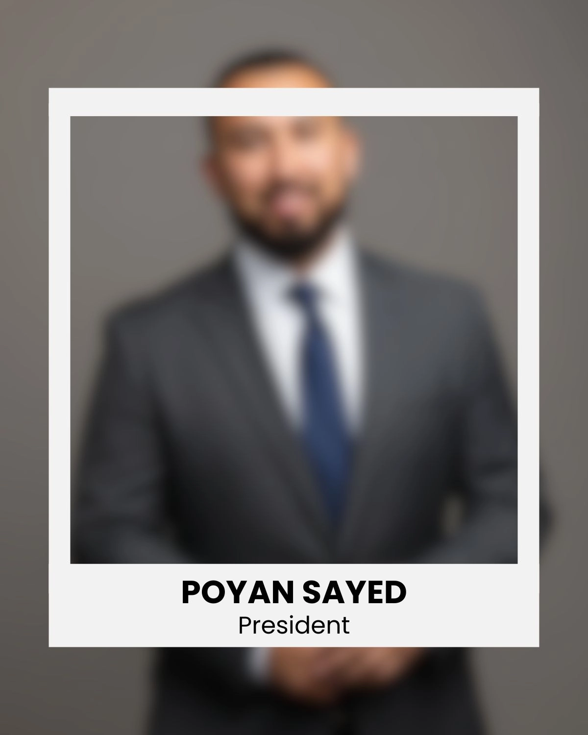 Framed portrait of Poyan Sayed, President of Sayed Transport, Canadian trucking company, blurred background